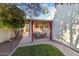 Enjoy the Arizona weather on this cozy back patio with plush outdoor seating, a ceiling fan, and a grill at 8405 E San Pedro Dr, Scottsdale, AZ 85258