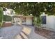 Lovely outdoor living space featuring a spa and covered patio perfect for entertaining guests and enjoying the Arizona weather at 8405 E San Pedro Dr, Scottsdale, AZ 85258