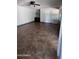 Bonus room featuring tile floor, ceiling fan, and dark wood cabinetry at 8618 N 45Th Dr, Glendale, AZ 85302