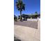 Single story home with manicured rock landscaping, well maintained exterior, and palm tree at 8618 N 45Th Dr, Glendale, AZ 85302