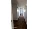 Neutral hallway with durable tile flooring and lighting at 8618 N 45Th Dr, Glendale, AZ 85302