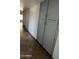 Hallway with storage and tile flooring at 8618 N 45Th Dr, Glendale, AZ 85302