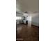 Open-concept kitchen with modern appliances, granite countertops, and a cozy breakfast bar at 8618 N 45Th Dr, Glendale, AZ 85302