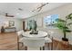 Cozy dining area with modern lighting and large windows at 8701 E Sage Dr, Scottsdale, AZ 85250