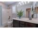 Bathroom features a vanity, toilet and shower/tub combination at 900 E Harrison St, Chandler, AZ 85225