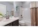 Bathroom features a vanity, toilet and shower/tub combination at 900 E Harrison St, Chandler, AZ 85225