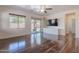 Bright and airy living room with modern flooring, built-in shelving and a view of the backyard at 900 E Harrison St, Chandler, AZ 85225