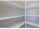 Pantry featuring multiple tiers of shelving, offering ample storage and organization at 900 E Harrison St, Chandler, AZ 85225