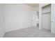 Clean, bright bedroom with neutral carpet and trim, ready for personalization at 9775 S 36Th Ln, Laveen, AZ 85339
