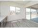 Dining area with sliding glass doors leading to a patio and views of the surrounding landscape at 9775 S 36Th Ln, Laveen, AZ 85339