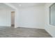 Bright and airy living room with large windows and a neutral color palette at 9775 S 36Th Ln, Laveen, AZ 85339