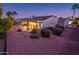Expansive backyard with desert landscaping, providing a serene outdoor living space at 12928 W Santa Ynez Dr, Sun City West, AZ 85375