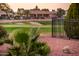 Beautiful home overlooking a golf course, featuring lush green fairways and mature desert landscaping at 12928 W Santa Ynez Dr, Sun City West, AZ 85375