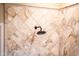 Spa-like shower featuring decorative tile work and a rain shower head at 12928 W Santa Ynez Dr, Sun City West, AZ 85375