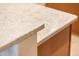 Close-up of a kitchen countertop, highlighting its unique texture and design at 12928 W Santa Ynez Dr, Sun City West, AZ 85375