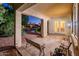 Charming covered patio with comfortable seating, and great curb appeal at 12928 W Santa Ynez Dr, Sun City West, AZ 85375