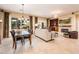 Open concept dining room with view of backyard at 12928 W Santa Ynez Dr, Sun City West, AZ 85375