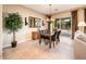 Bright dining room featuring backyard view at 12928 W Santa Ynez Dr, Sun City West, AZ 85375
