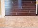 Transitioning tiled floors from room to room at 12928 W Santa Ynez Dr, Sun City West, AZ 85375