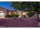 Charming home showcasing meticulously maintained desert landscaping and an inviting front entrance at 12928 W Santa Ynez Dr, Sun City West, AZ 85375