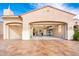 Spacious garage featuring high ceilings, epoxy flooring, storage cabinets, and organizational overhead racks at 12928 W Santa Ynez Dr, Sun City West, AZ 85375