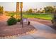 Golf course view with signage at 12928 W Santa Ynez Dr, Sun City West, AZ 85375