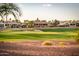 This house is located on a well-manicured golf course with lush greenery and sandy bunkers at 12928 W Santa Ynez Dr, Sun City West, AZ 85375