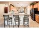 Open kitchen with bar seating at 12928 W Santa Ynez Dr, Sun City West, AZ 85375