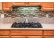 Close-up of the kitchen with stainless steel appliances, stylish backsplash, and ample counter space at 12928 W Santa Ynez Dr, Sun City West, AZ 85375