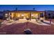 Covered patio with outdoor seating, a grill, and a beautiful landscaped yard at 12928 W Santa Ynez Dr, Sun City West, AZ 85375