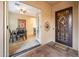 Outdoor patio view with an ornate security door, as seen from breakfast nook at 12928 W Santa Ynez Dr, Sun City West, AZ 85375