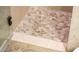 Pebble tile shower floor at 12928 W Santa Ynez Dr, Sun City West, AZ 85375