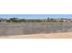 Backyard perimeter featuring a block wall on a desert landscape at 1324 S Mullberry St, Florence, AZ 85132