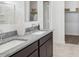 Bathroom features a double sink vanity with granite counters and storage below at 1324 S Mullberry St, Florence, AZ 85132