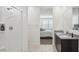 Spa-like bathroom with double sinks, granite countertops, and a walk-in shower at 1324 S Mullberry St, Florence, AZ 85132