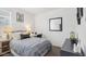 Inviting bedroom with a study desk, neutral decor, and comfortable bedding at 1324 S Mullberry St, Florence, AZ 85132