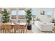 Bright dining area with wood table, seating for six, and views of the backyard at 1324 S Mullberry St, Florence, AZ 85132