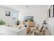 Bright living area with comfortable seating, modern décor, and large windows for ample natural light at 1324 S Mullberry St, Florence, AZ 85132