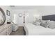 Cozy main bedroom with a comfortable bed, neutral decor, and closet access at 1324 S Mullberry St, Florence, AZ 85132