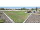 Park area featuring a grassy area and a patio table with chairs for community enjoyment at 1324 S Mullberry St, Florence, AZ 85132