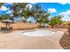 Backyard featuring an empty swimming pool and outdoor dining area at 134 E Le Marche Ave, Phoenix, AZ 85022