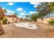 Backyard view of an empty pool and outdoor living space at 134 E Le Marche Ave, Phoenix, AZ 85022