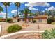 Inviting single-story home with well-maintained desert landscaping and a brick facade at 134 E Le Marche Ave, Phoenix, AZ 85022