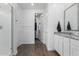 Bright bathroom featuring a walk-in shower, closet and granite countertop at 14549 W Corrine Dr, Surprise, AZ 85379