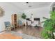 Open-concept home office with two computer desks, shelving, and natural light at 14549 W Corrine Dr, Surprise, AZ 85379