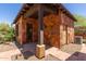 Charming exterior featuring stone accents and a covered entrance at 14619 E Desert Vista Trl, Scottsdale, AZ 85262