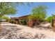 Charming home featuring desert landscaping, secure entry, and a long driveway at 14619 E Desert Vista Trl, Scottsdale, AZ 85262
