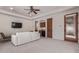 Well-lit living room featuring plush seating and built-in bar area at 14619 E Desert Vista Trl, Scottsdale, AZ 85262