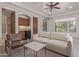 Bright living room featuring built-in bar, recessed lighting, and plush furniture at 14619 E Desert Vista Trl, Scottsdale, AZ 85262