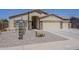 Charming single-story home featuring desert landscaping and a three-car garage at 1726 E Primera Dr, Casa Grande, AZ 85122